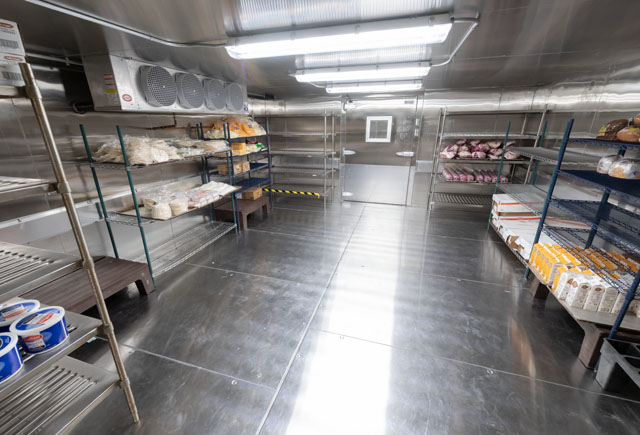 why is my walk-in cooler freezing up