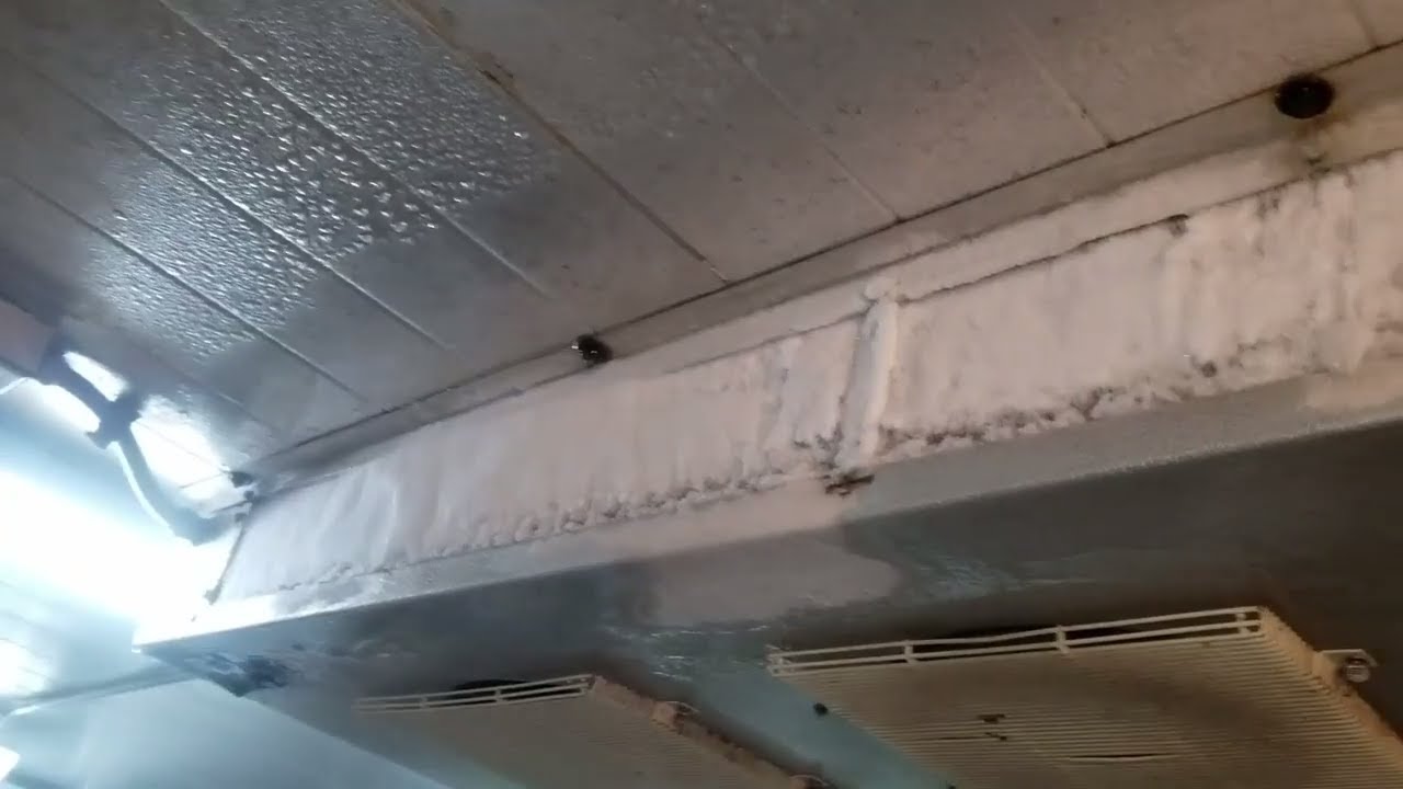 why is my walk-in cooler freezing up